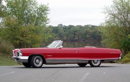 1965 Pontiac Bonneville convertible with 8-lug wheels.