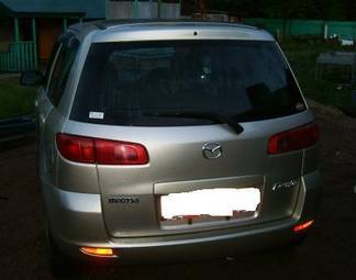 2002 Mazda Demio Photos