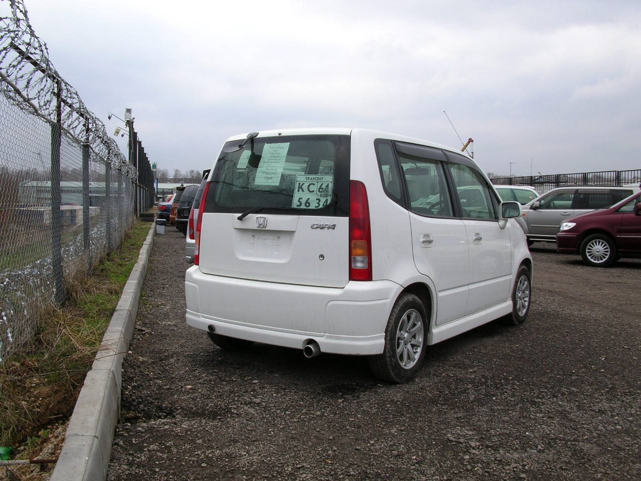2003 Mazda Demio Photos