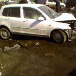 2003 Mazda Demio Photos