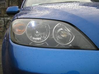 2003 Mazda Demio Photos