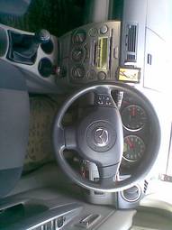 2003 Mazda Demio Photos