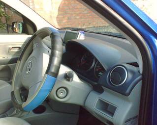 2003 Mazda Demio Photos