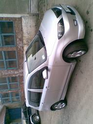 2003 Mazda Demio Photos
