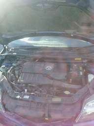 2004 Mazda Demio Pictures