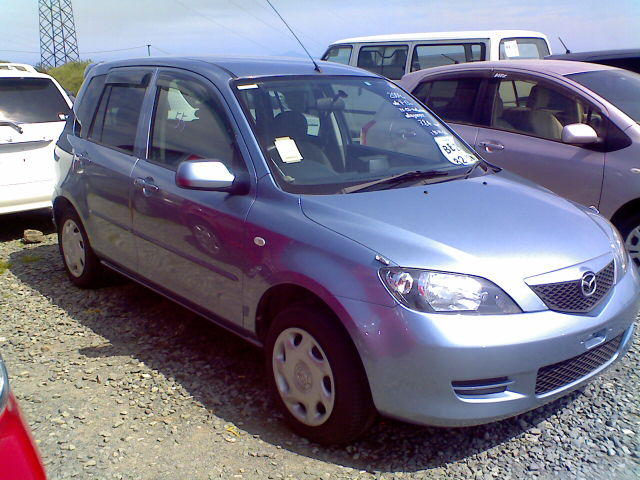 Мазда demio 2004