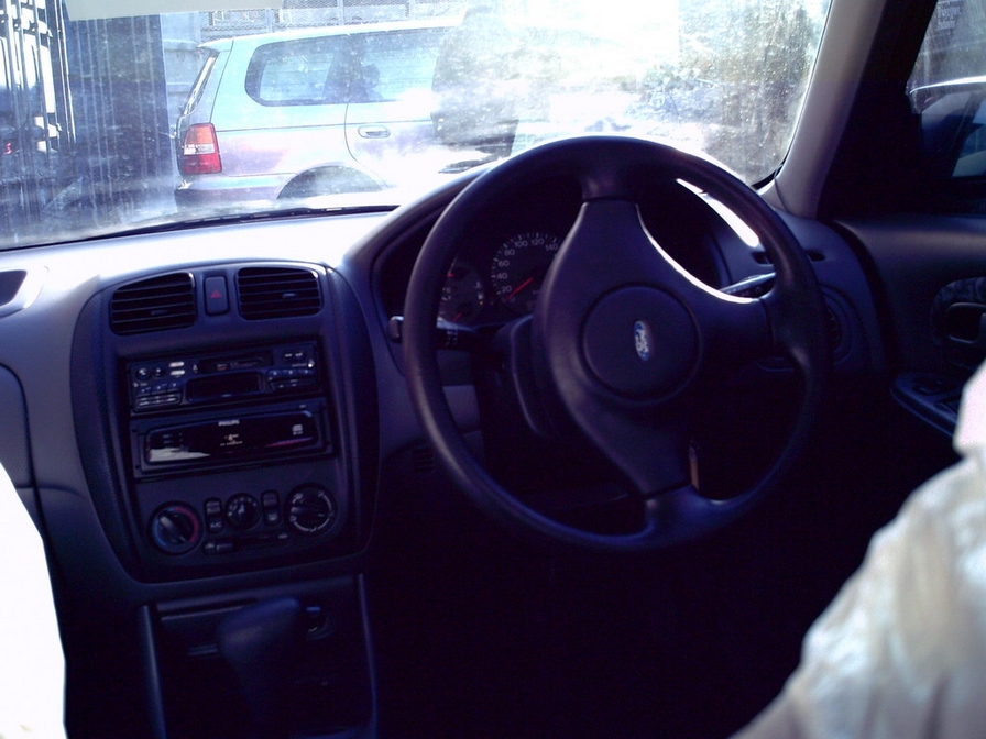 1999 Mazda Ford Laser Photos