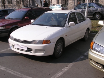 Mitsubishi 96. Митсубиси Лансер 1996. Мицубиси 1996. Митсубиси 1996г. Митсубиси Лансер 1996 года 1.3.