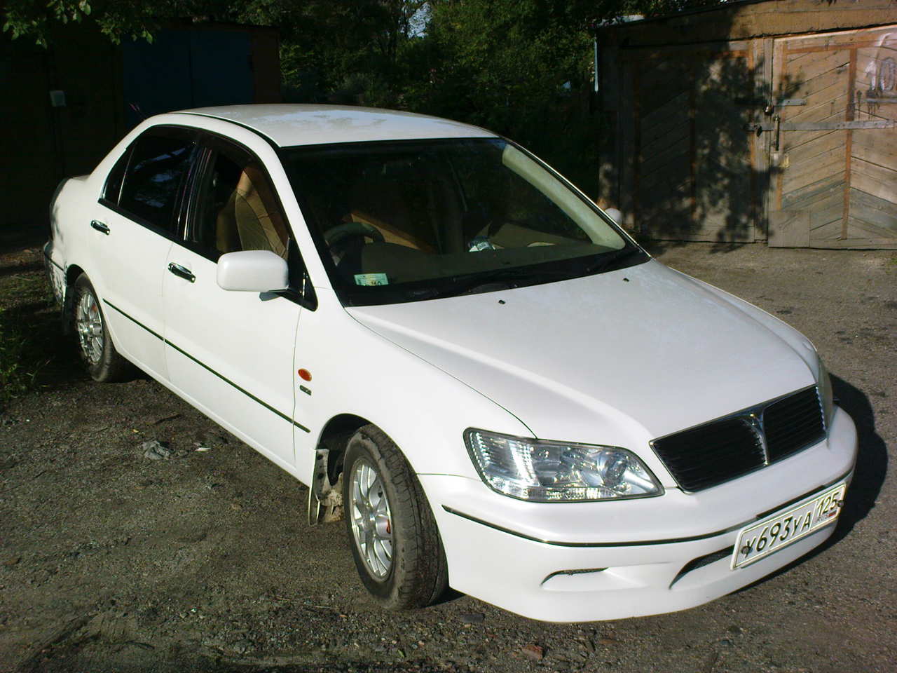 митсубиси лансер цедия 2001