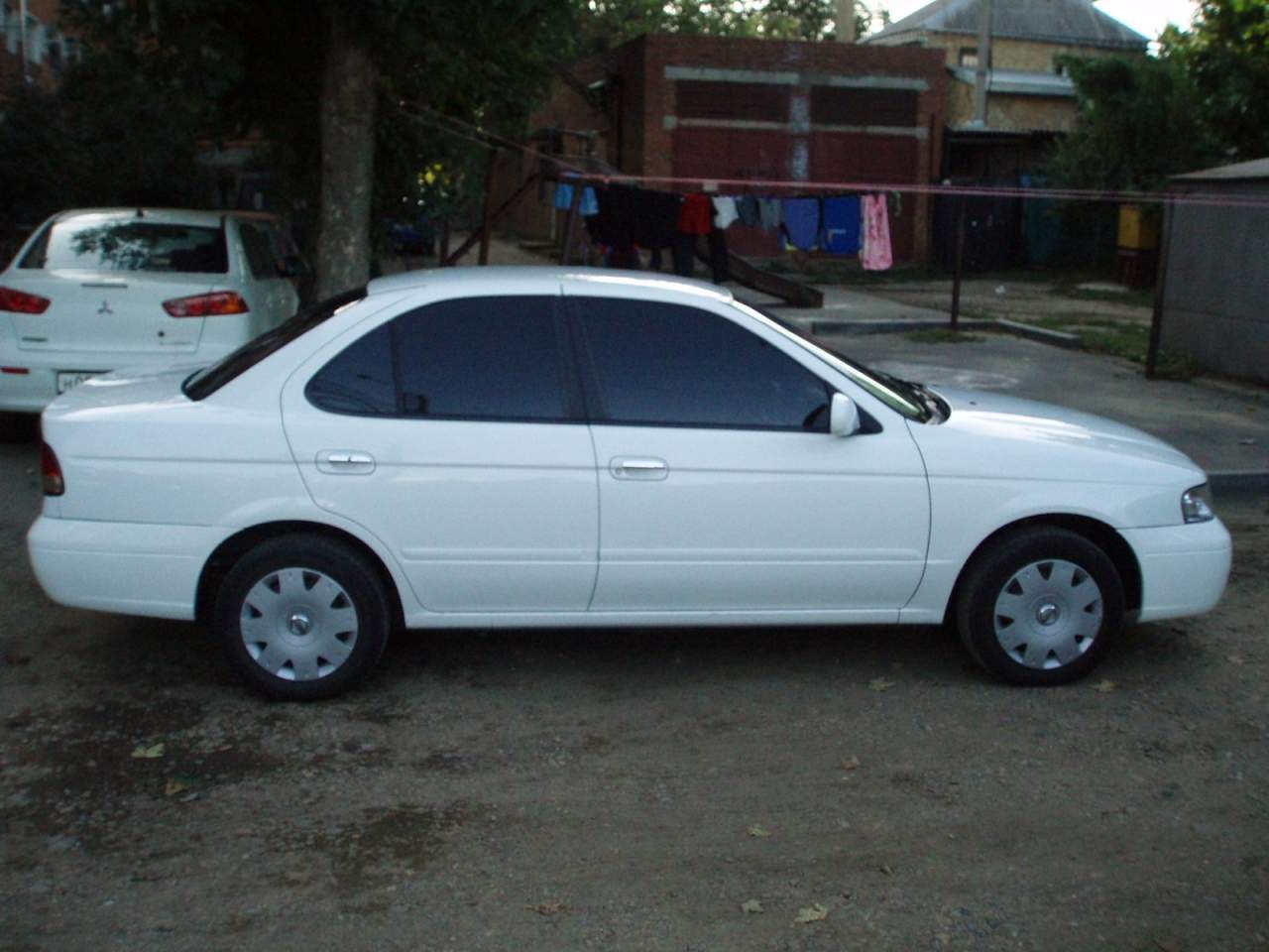 Ниссан санни край. Nissan Sunny 2004. Ниссан Sunny 2004. Ниссан Санни 2004г. Ниссан Санни 2004 года.