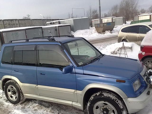 Сузуки эскудо 1996. Suzuki Escudo 1996 года. Сузуки эскудо 1996 Рестайлинг. Сузуки эскудо красная 1996.